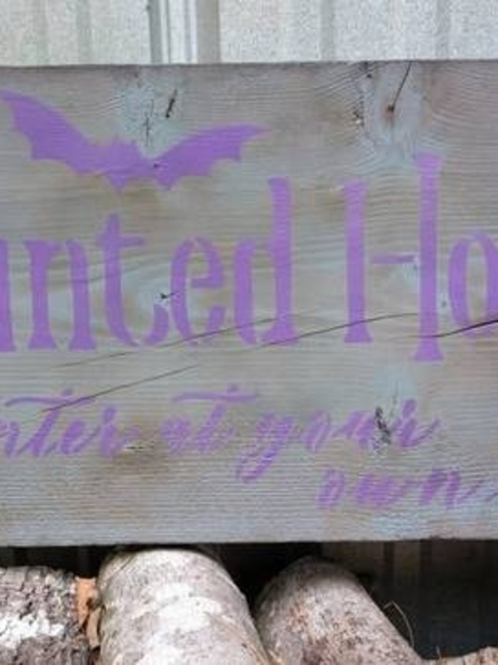 Haunted Home Decorative Wood Sign in Purple